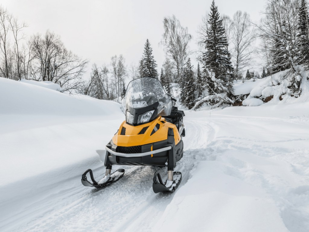 snowmobile on snowy path