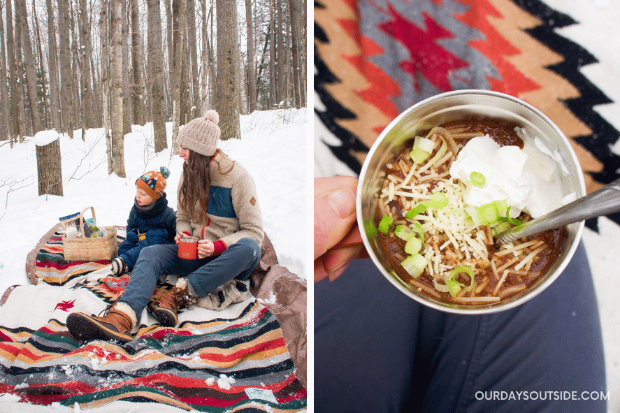 mother and small boy sitting on picnic blanket in snow covered woods - winter activities for kids